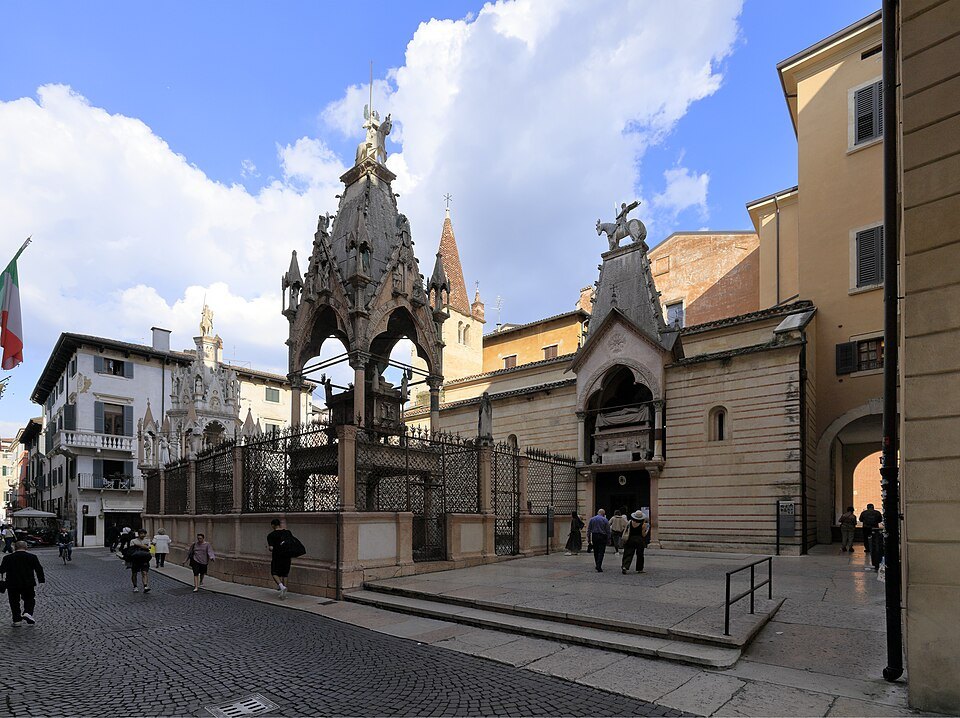 The tombs behind their iron grille beside Santa Maria Antica