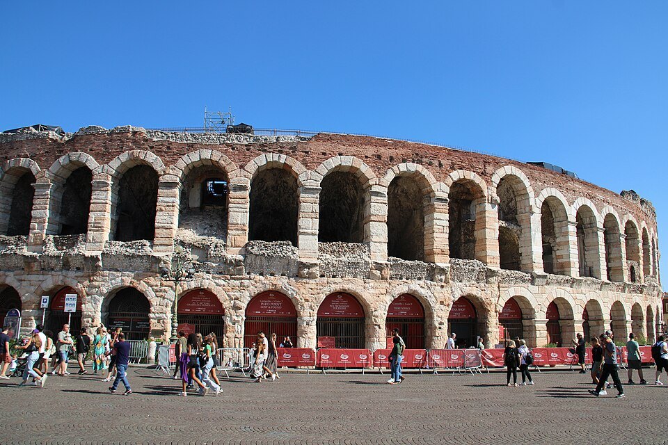 The Arena's arches with festival barriers along the pavement