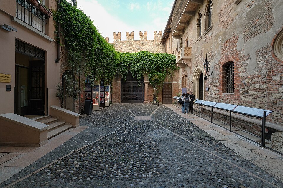The cobbled courtyard seen from the entrance passage
