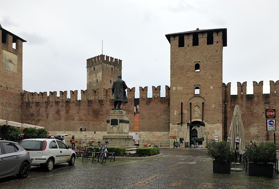 The castle's battlements and tower from the street