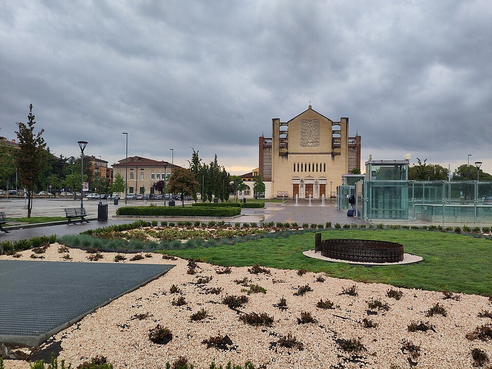 The station forecourt garden at Porta Nuova under grey sky