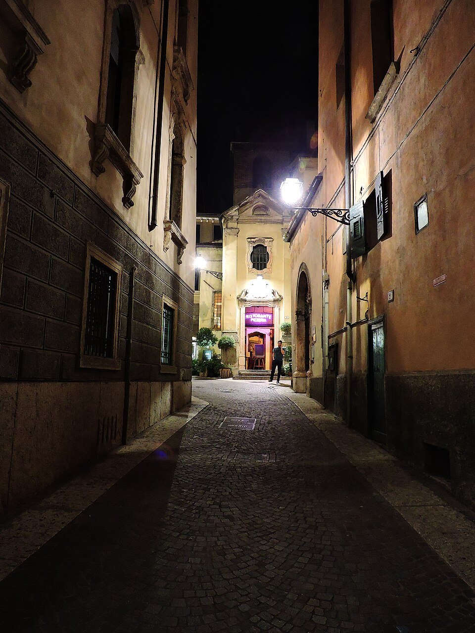 Vicolo San Matteo lit at night