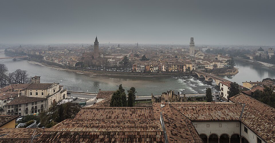 The Adige loop under haze from the hill