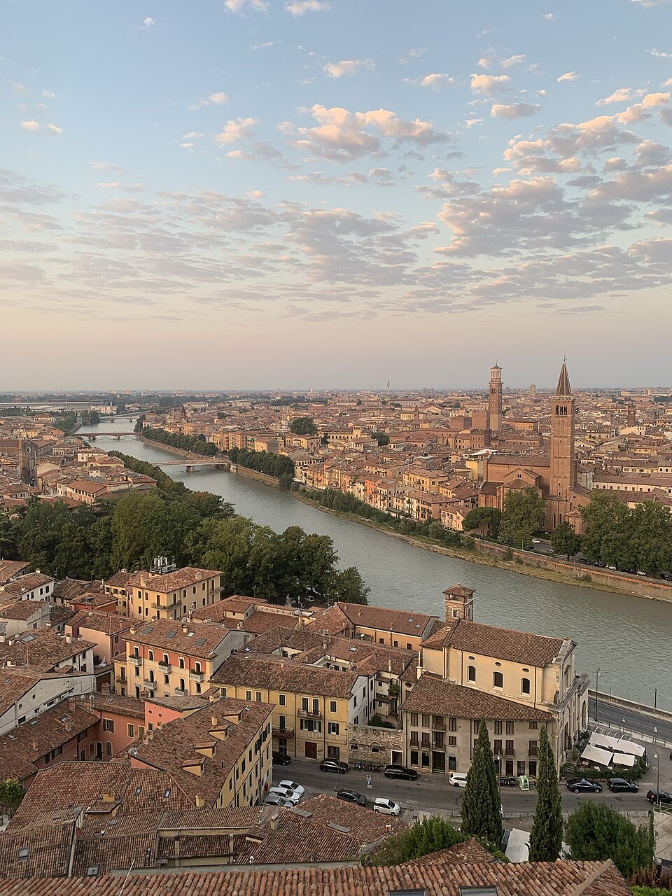 The river and roofs from the Castel San Pietro terrace in soft light