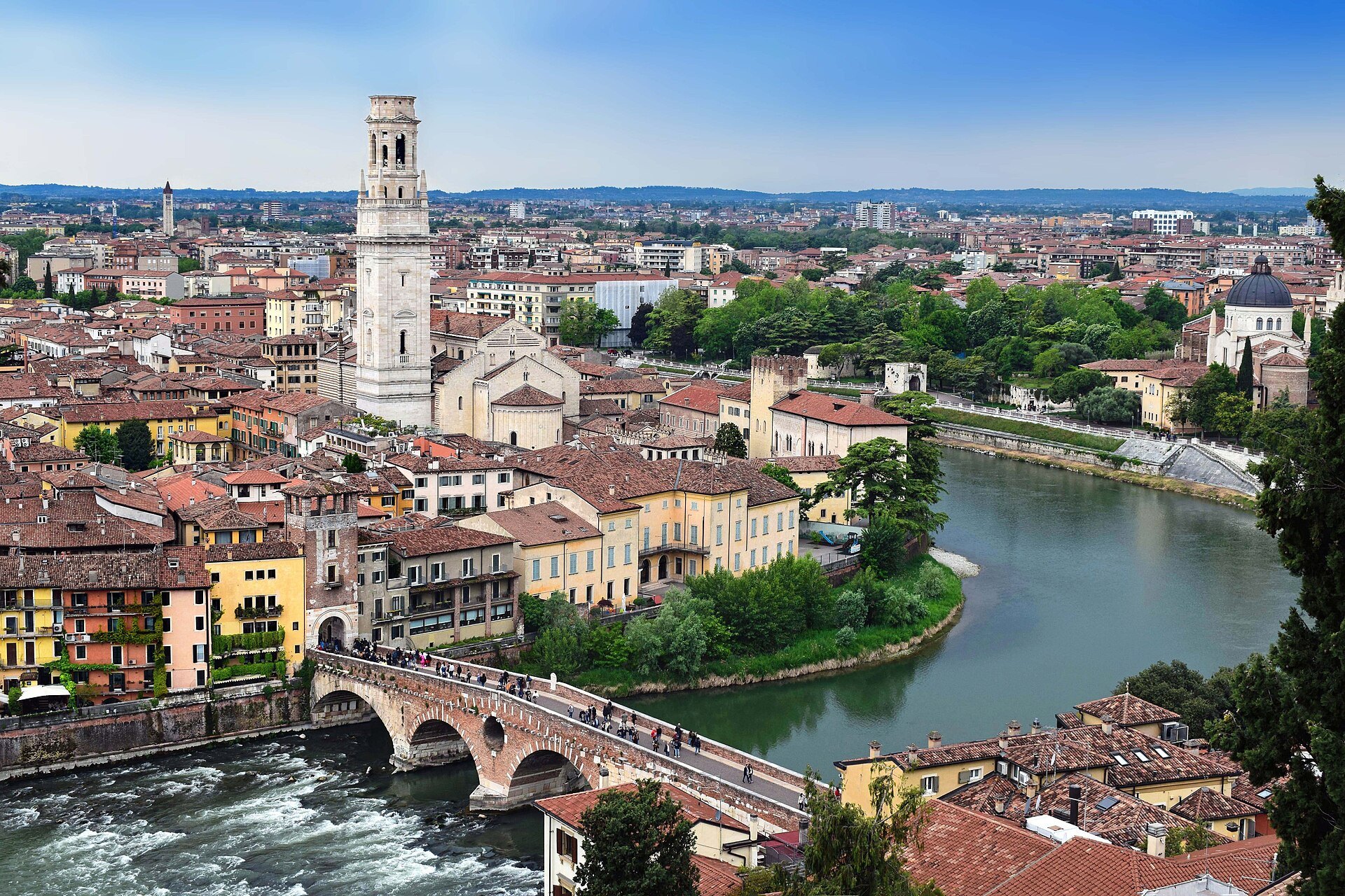 The Adige bending round Verona's old centre, the Ponte Pietra and the Duomo's bell tower, seen from Castel San Pietro
