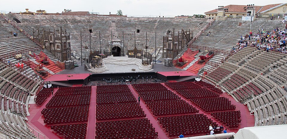 The Arena set for opera, rows of red seats and the stage