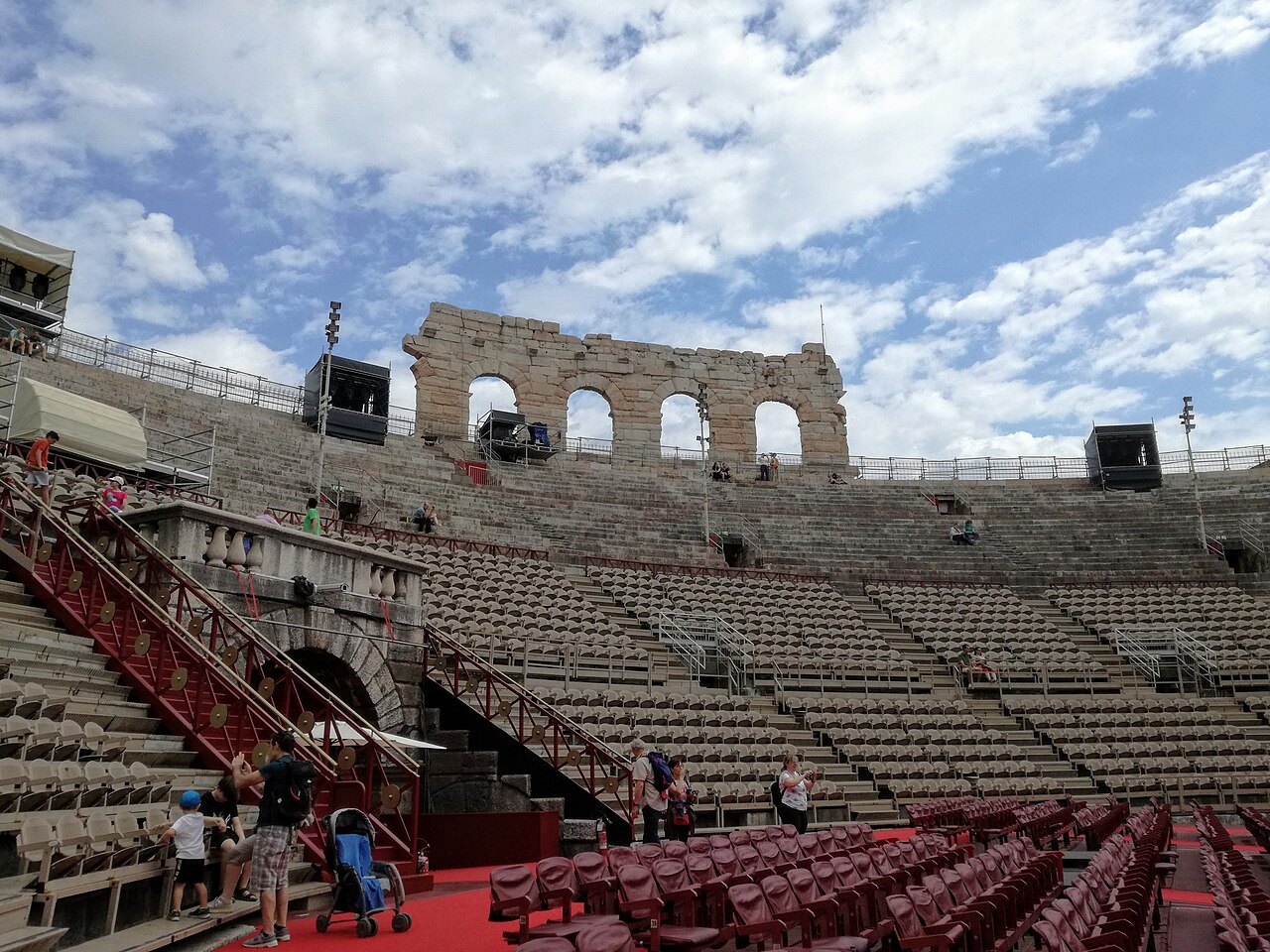 Stone steps, stairs and red seats inside the Arena