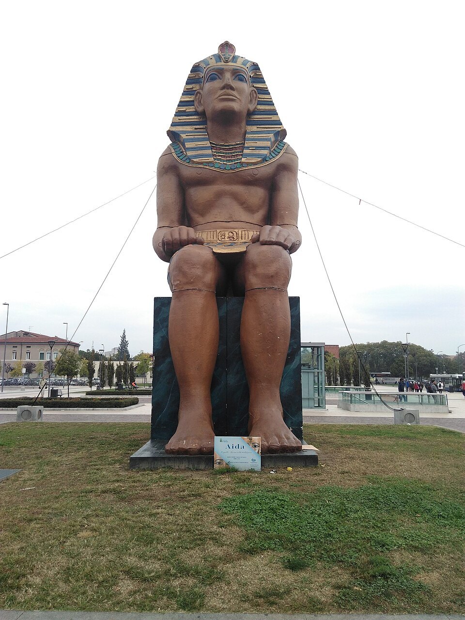 A giant pharaoh from an Aida stage set, stored beside the road