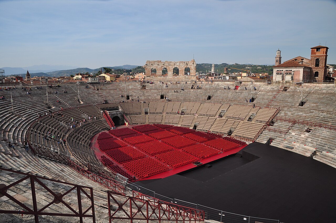 The stage and red seating seen from the upper tiers