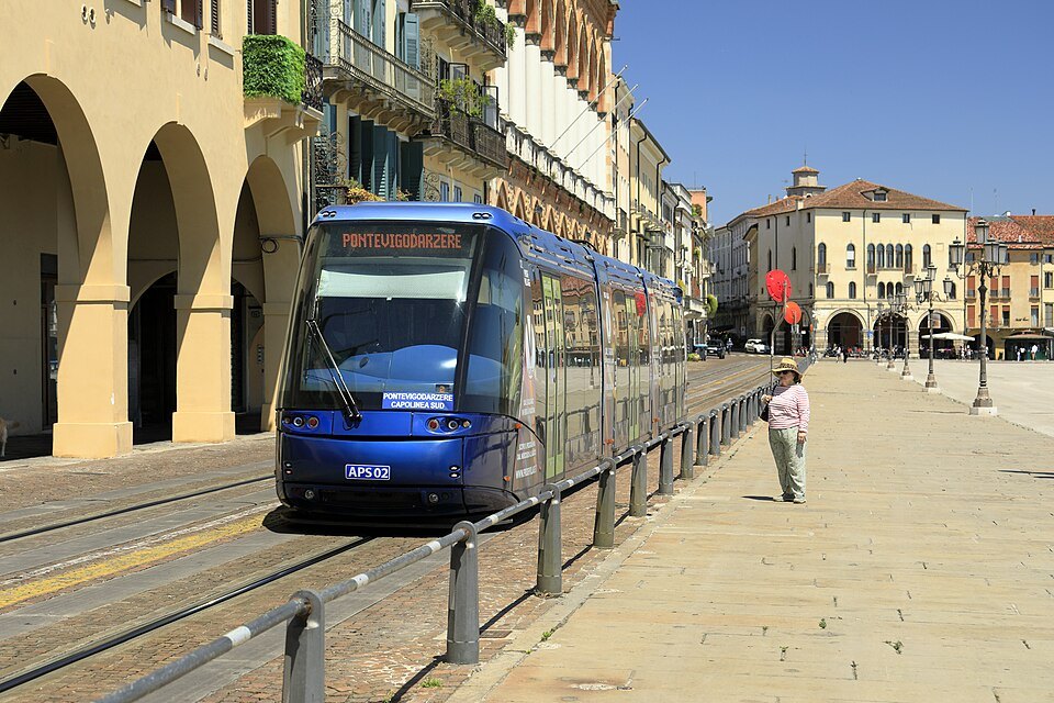 A tram in Padua by the arcades near Prato della Valle