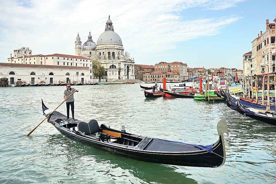 A gondola on the Grand Canal in Venice, the Salute behind