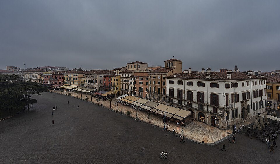 Piazza Bra from above under a grey sky, the Liston along one side