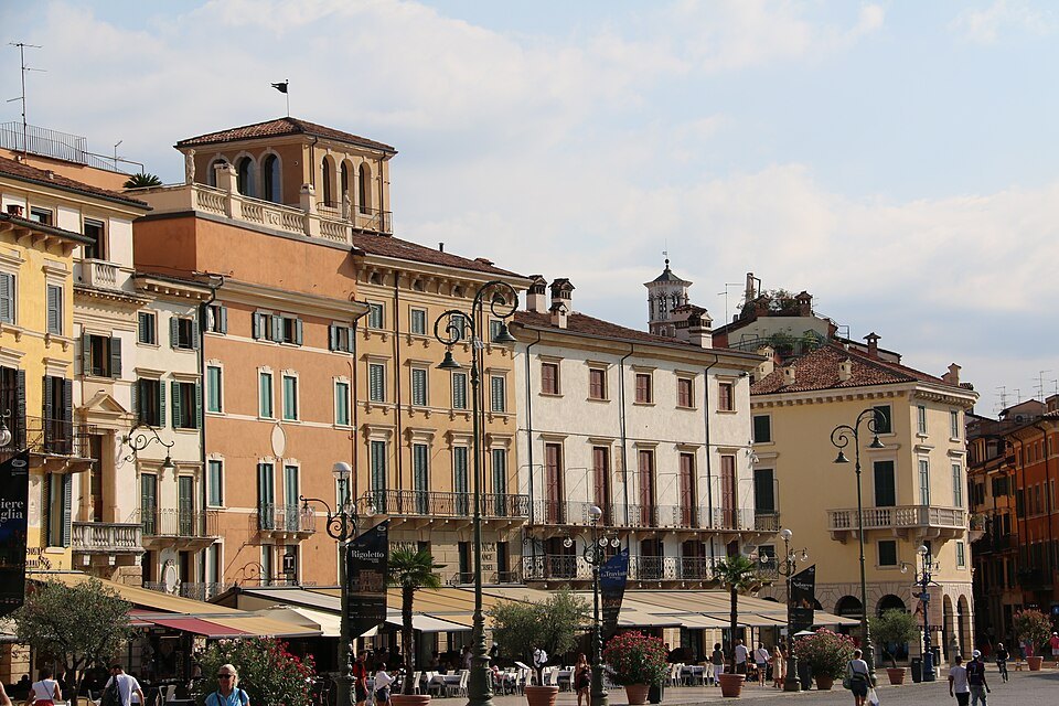 The colored palazzi along the Liston, café awnings at street level