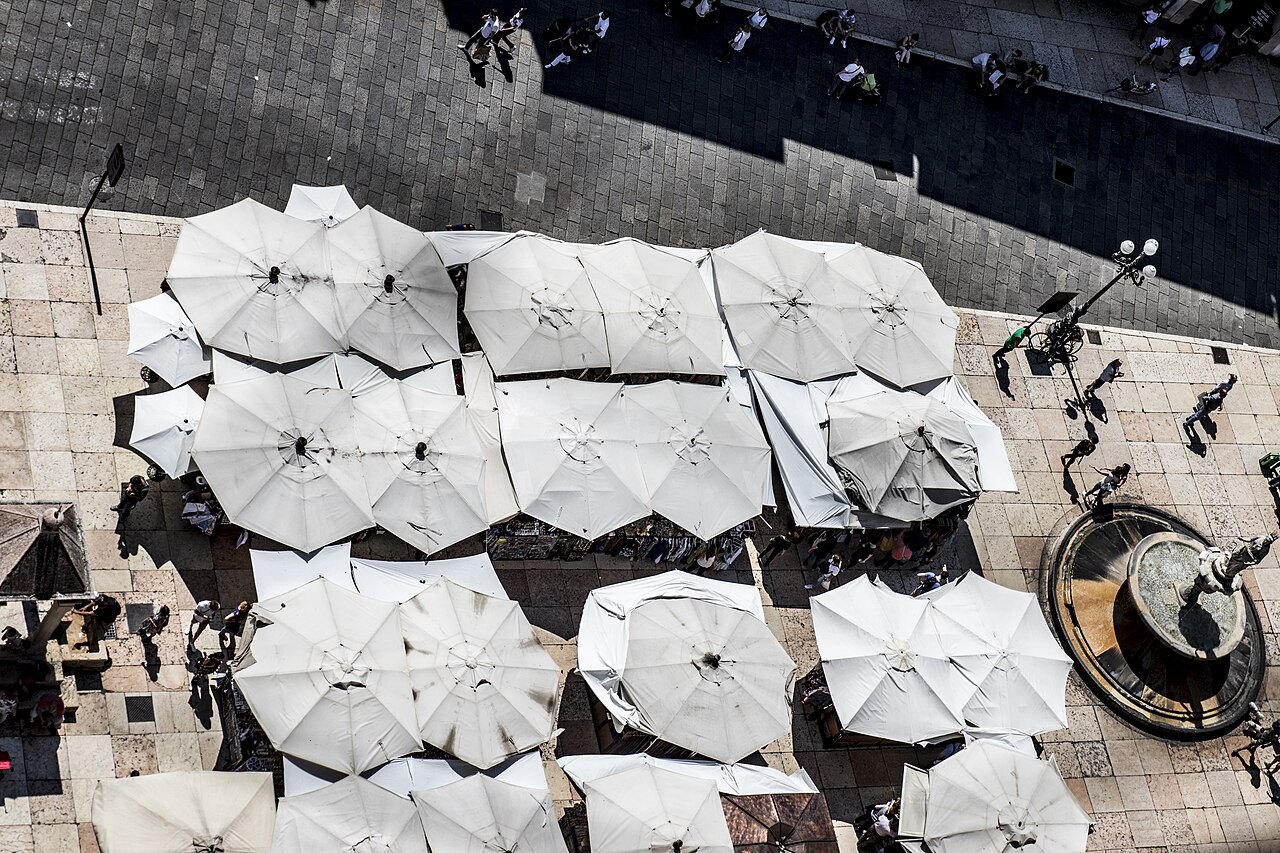 Umbrellas over Piazza delle Erbe seen from the tower