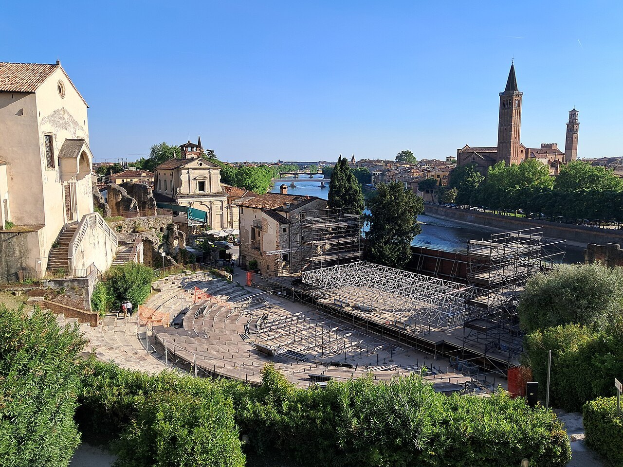 The Roman theater's seating on the hillside, the river and the old city beyond