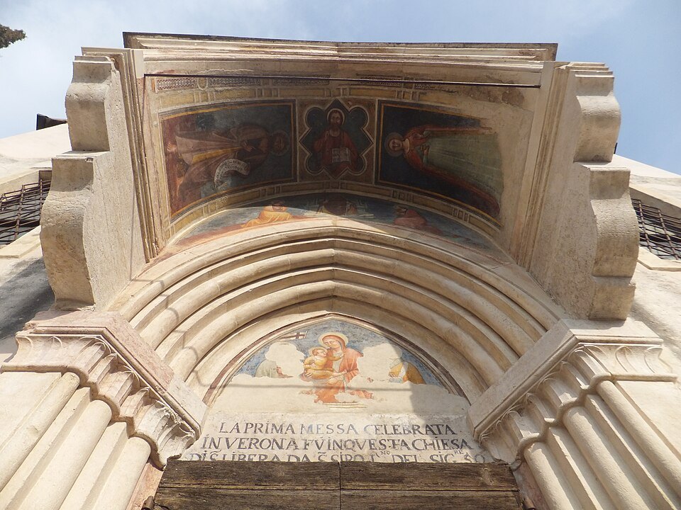 Frescoes above the door of Santi Siro e Libera