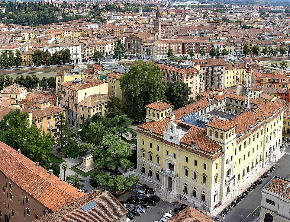 The view from the tower over roofs and a green courtyard
