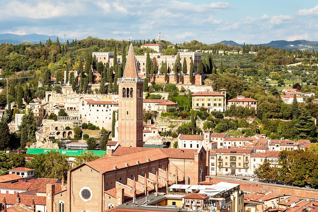 The view from the Torre dei Lamberti over Sant'Anastasia's bell tower and the hill beyond