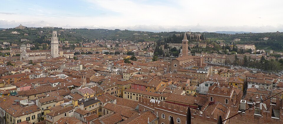 Red roofs stretching to the hills from high above the old center